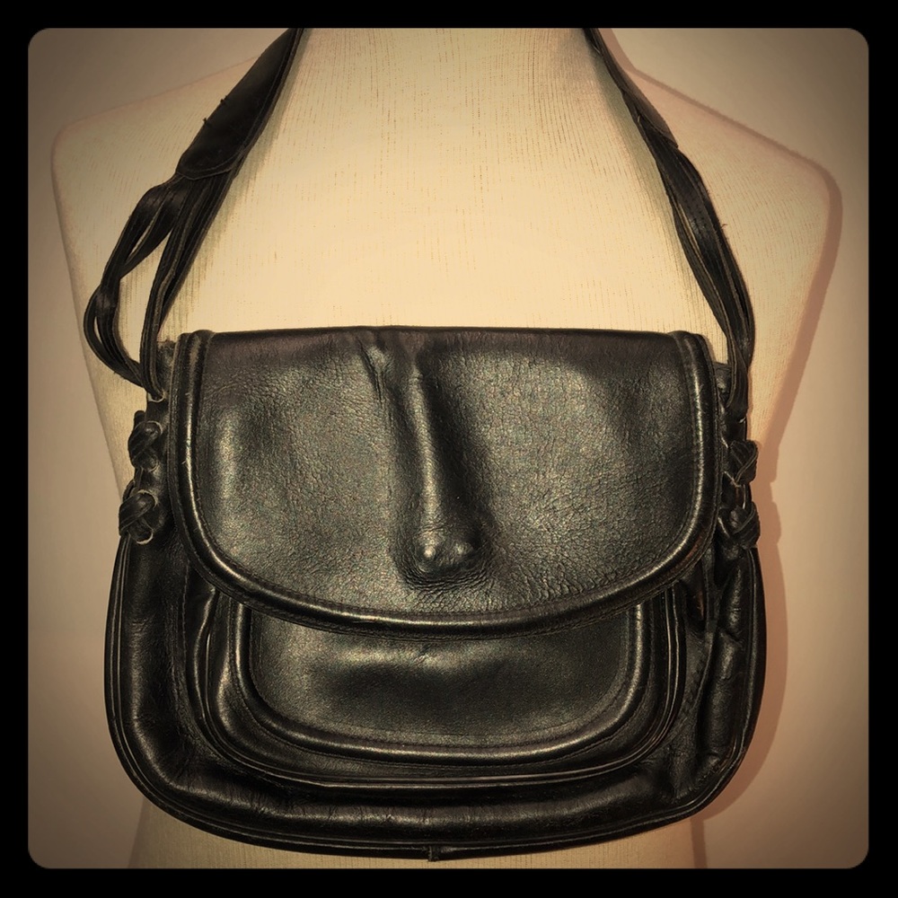 Vintage 70s Don Quixote purse thick leather.